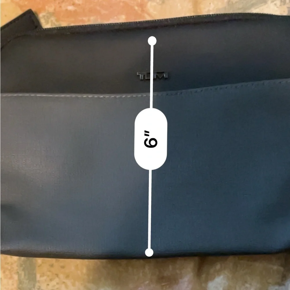 Tumi Black and Gray Toiletry Bags Sleek Durable Design